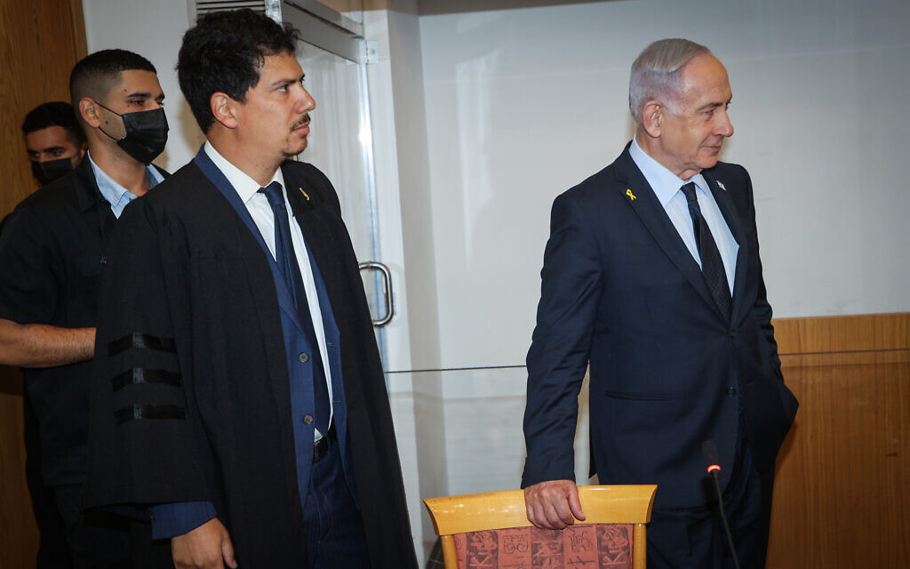 Prime Minister Benjamin Netanyahu arrives at the Tel Aviv District Court, before the start of his testimony in his corruption trial, May 14, 2025 (Yariv Katz/POOL)