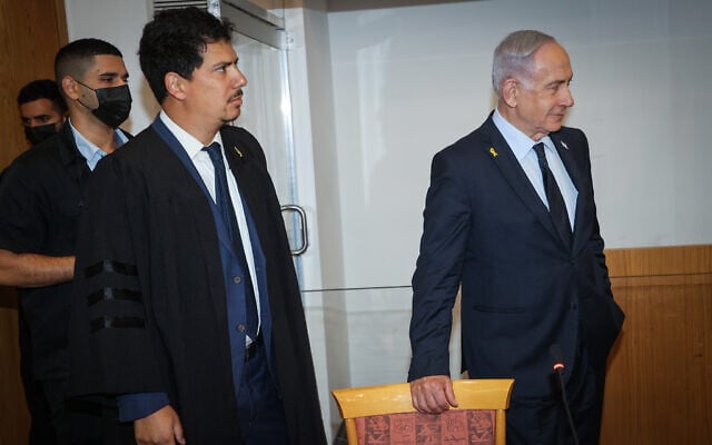 Prime Minister Benjamin Netanyahu arrives at the Tel Aviv District Court, before the start of his testimony in his corruption trial, May 14, 2025 (Yariv Katz/POOL) Prime Minister Benjamin Netanyahu arrives at the Tel Aviv District Court, before the start of his testimony in his corruption trial, May 14, 2025 (Yariv Katz/POOL)