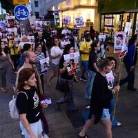 Family and friends of Israeli hostages brothers Ziv and Gali Berman march through the streets of Tel Aviv, calling for their release from Hamas captivity on May 15, 2025. (Tomer Neuberg/Flash90)