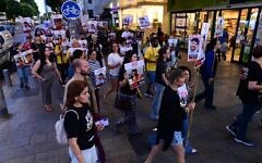 Family and friends of Israeli hostages brothers Ziv and Gali Berman march through the streets of Tel Aviv, calling for their release from Hamas captivity on May 15, 2025. (Tomer Neuberg/Flash90)