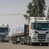 Trucks loaded with humanitarian aid on the Israeli side of the border with the Gaza Strip, May 19, 2025. (Flash90)