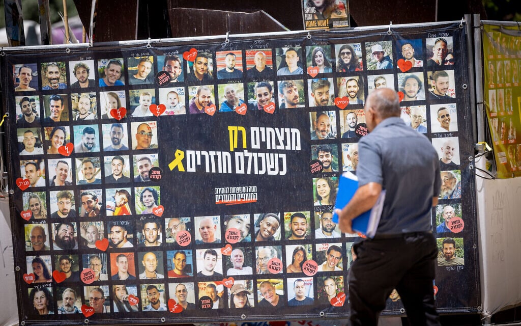 Pictures of hostages taken to Gaza on October 7, 2023, seen at Hostages Square in Tel Aviv, May 19, 2025. (Miriam Alster/Flash90)