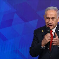 Prime Minister Benjamin Netanyahu holds a press conference at his office in Jerusalem on May 21, 2025. (Alex Kolomoisky/Pool/Flash90)