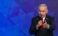 Prime Minister Benjamin Netanyahu holds a press conference at his office in Jerusalem on December 9, 2024. (Alex Kolomoisky/Pool/Flash90)