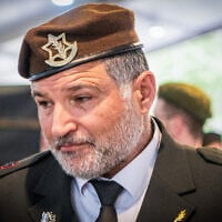 Maj. Gen. David Zini visits families of fallen Israeli soldiers during Memorial Day at Mount Herzl Military Cemetery in Jerusalem on April 30, 2025 (Arie Leib Abrams/Flash90)