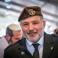 Maj. Gen. David Zini visits families of fallen Israeli soldiers during Memorial Day at Mount Herzl Military Cemetery in Jerusalem on April 30, 2025 (Arie Leib Abrams/Flash90)