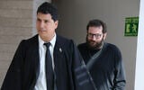 Qatargate suspect Jonatan Urich arrives to a hearing at the Central District Court with his attorney, Amit Hadad, on May 22, 2025. (Jonathan Shaul/Flash90)