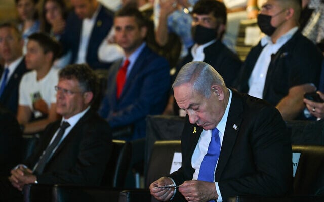 Prime Minister Benjamin Netanyahu, right, and Supreme Court President Isaac Amit attend a Jerusalem Day state ceremony at Ammunition Hill in Jerusalem, May 26, 2025. (Arie Leib Abrams/Flash90) Prime Minister Benjamin Netanyahu, right, and Supreme Court President Isaac Amit attend a Jerusalem Day state ceremony at Ammunition Hill in Jerusalem, May 26, 2025. (Arie Leib Abrams/Flash90)