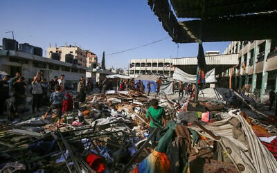 Palestinians at the site of an Israeli airstrike in Gaza City, on May 26, 2025. (Photo by Ali Hassan/Flash90)