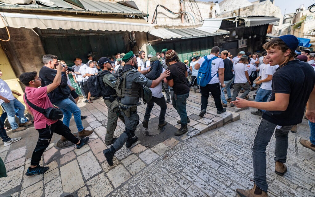 Two teens charged with racist assault of Palestinian man during Jerusalem Day march