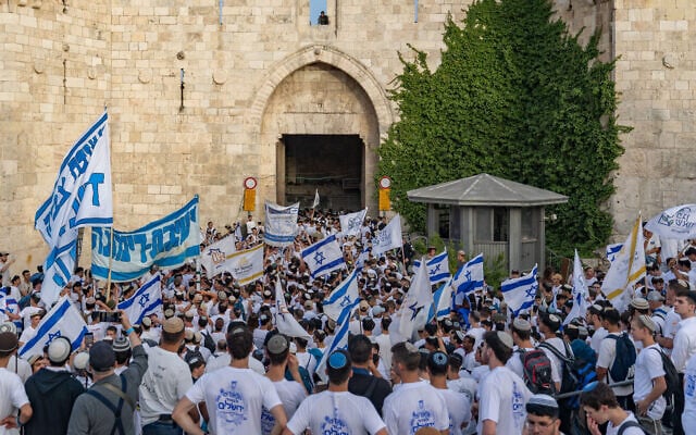 Israelis celebrate Jerusalem Day during the Flag March in Jerusalem's Old City, May 26, 2025. (Chaim Goldberg/Flash90)