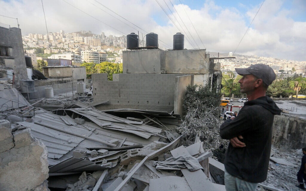 Palestinians inspect the home of a Hamas member behind a failed 2024 Tel Aviv suicide bombing, after the house was destroyed by Israeli security forces, in the West Bank city of Nablus, May 29, 2025. (Nasser Ishtayeh/Flash90)
