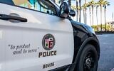 Illustrative: An undated close-up of the insignia and slogan of an LAPD vehicle. (Getty Images)