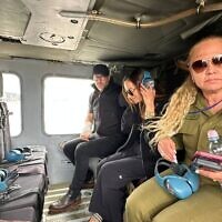 Yael Alexander (center), mother of hostage Edan, and US hostage envoy Adam Boehler (left) board a helicopter en route to southern Israel, ahead of Edan's expected release from Hamas captivity, May 12, 2025 (Courtesy used in accordance with Clause 27a of the Copyright Law)