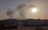 Smoke rises from the Hodeidah port in western Yemen following an Israeli airstrike, May 16, 2025. (Social media: used in accordance with Clause 27a of the Copyright Law)