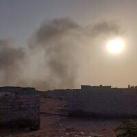 Smoke rises from the Hodeidah port in western Yemen following an Israeli airstrike, May 16, 2025. (Social media: used in accordance with Clause 27a of the Copyright Law)