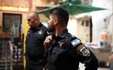 Police officers work the scene of a stabbing at the Temple Mount's Chain Gate, in the Old City of Jerusalem, May 16, 2025. (Israel Police)
