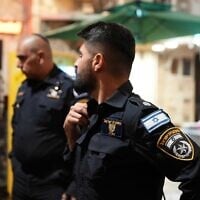 Police officers work the scene of a stabbing at the Temple Mount's Chain Gate, in the Old City of Jerusalem, May 16, 2025. (Israel Police)