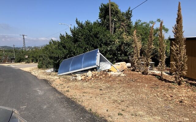 A bus stop in Shtula damaged by Hezbollah rocket fire during the Israel-Hezbollah war on May 23, 2025. (Diana Bletter/Times of Israel)