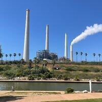 The coal-fired Orot Rabin power station in Hadera, central Israel, seen from the Hadera Stream National Park, April 25, 2025. (Sue Surkes/Times  of Israel)