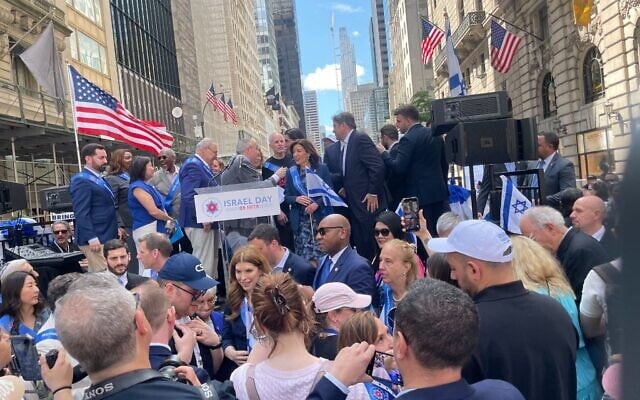Dani Miran, the father of hostage Omri Miran, and released hostages Aviva and Keith Siegel at the New York City Israel Day Parade, May 18, 2025. (Jessica Steinberg/ Times of Israel) Dani Miran, the father of hostage Omri Miran, and released hostages Aviva and Keith Siegel at the New York City Israel Day Parade, May 18, 2025. (Jessica Steinberg/ Times of Israel)