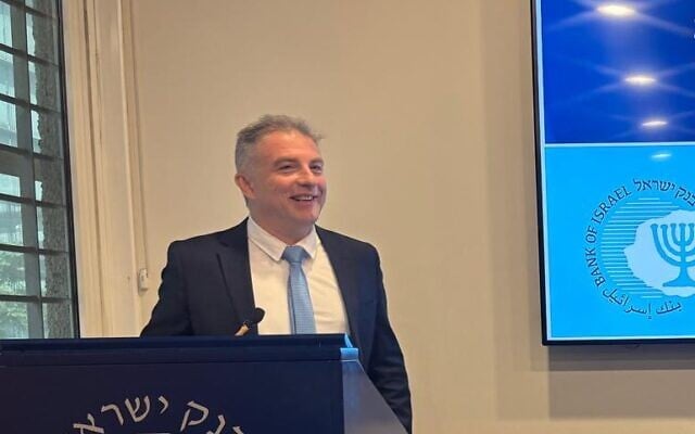 Banking supervisor Daniel Hahiashvili speaks at a press conference in Tel Aviv on May 19, 2025. (Sharon Wrobel/Times of Israel)