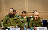 Lt. Col. Avigdor Dickstein (left), who is in charge of encouraging ultra-Orthodox enlistment, and Brig. Gen. Shay Tayeb (right), head of the IDF Personnel Directorate’s Planning and Personnel Management Division, at the Knesset Foreign Affairs and Defense Committee’s Subcommittee for IDF Human Resources, May 21, 2025. (Noam Moskowitz, Office of the Knesset Spokesperson)