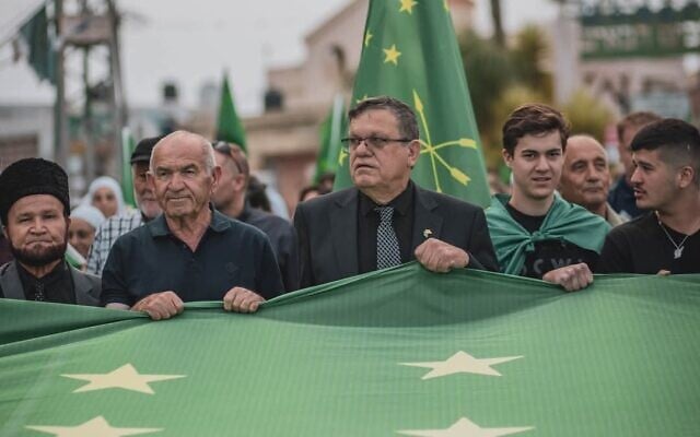 Zakaria Napso, center, mayor of the Circassian village Kfar Kama, at the annual Circassian Memorial Day event on May 21, 2024. (Courtesy/Adam Choshha)