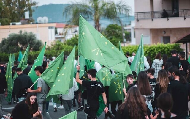 Circassians hold Circassian flags and commemorate the Circassian Mourning Day in Kfar Kama on May 21, 2024. (Courtesy/Aibek Napso)
