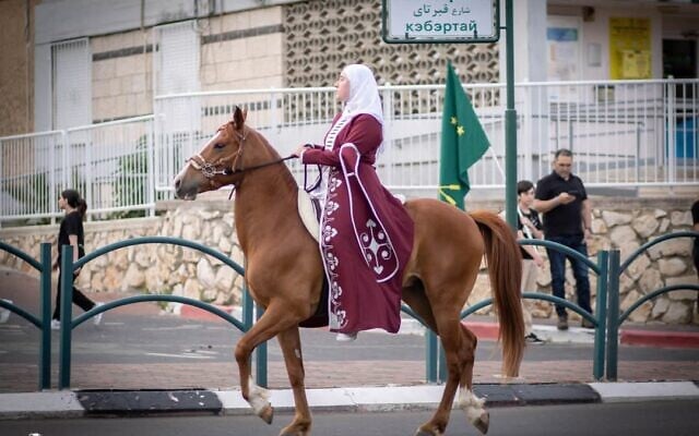 A Circassian woman commemorates the Circassian Mourning Day in Kfar Kama on May 21, 2024. (Courtesy/Adam Choshha)