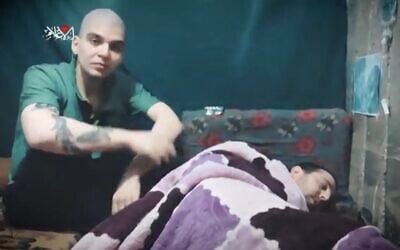 Hamas hostages Yosef-Haim Ohana and Elkana Bohbot appear in a Hamas propaganda video published by the terror group on May 10, 2025. (Screenshot)