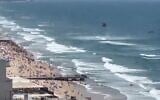 Rescue efforts in Bat Yam after a light plane crashed off the beach, May 16, 2025 (Video screenshot)
