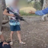 Jerusalemite Akiva Cohen harasses and threatens an Arab family picnicking on Jordan River, in video captured May 3, 2025. (Screenshot via X, used in accordance with Clause 27a of the Copyright Law)