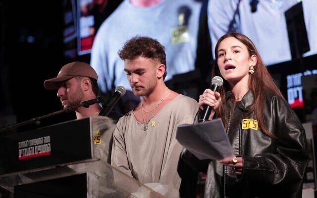 (L-R:) Freed hostages Omer Shem Tov, Itay Regev, and Maya Regev address protesters at Tel Aviv's Hostages Square, May 3, 2025. (Alon Gilboa/Pro-Democracy Protest Movement) (L-R:) Freed hostages Omer Shem Tov, Itay Regev, and Maya Regev address protesters at Tel Aviv's Hostages Square, May 3, 2025. (Alon Gilboa/Pro-Democracy Protest Movement)
