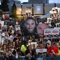 Protesters hold signs with images of the hostages at a weekly anti-government protest at Habima Square in Tel Aviv, May 10, 2025. (Paulina Patimer/Pro-Democracy Protest Movement)