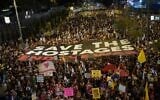 Protesters at Begin Road in Tel Aviv on May 24, 2025, carry a large banner, 'Save the Hostages End the War' (Credit: Dana Reany/Israeli Pro-Democracy Movement)