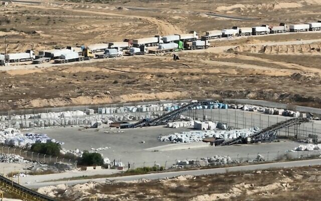 Aid awaiting collection on the Gazan side of Kerem Shalom crossing, in a photo issued on May 27, 2025. (COGAT)