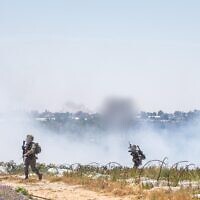 IDF troops operate in the Gaza Strip, in an image released on May 24, 2025. (Israel Defense Forces)