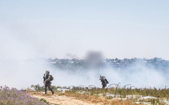 IDF troops operate in the Gaza Strip, in an image released on May 24, 2025. (Israel Defense Forces)