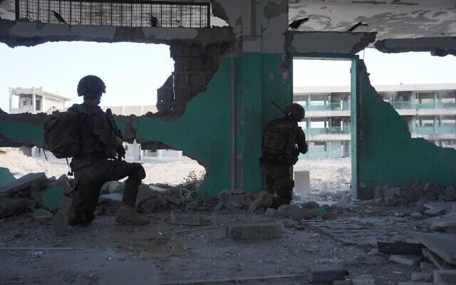IDF troops operate in the Gaza Strip in an undated photo published on May 23, 2025. (Israel Defense Forces) IDF troops operate in the Gaza Strip in an undated photo published on May 23, 2025. (Israel Defense Forces)