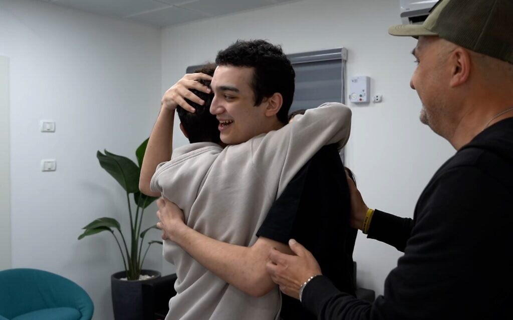 Released hostage Edan Alexander reunites with his family at an IDF base near Re'im, May 12, 2025. (Israel Defense Forces)