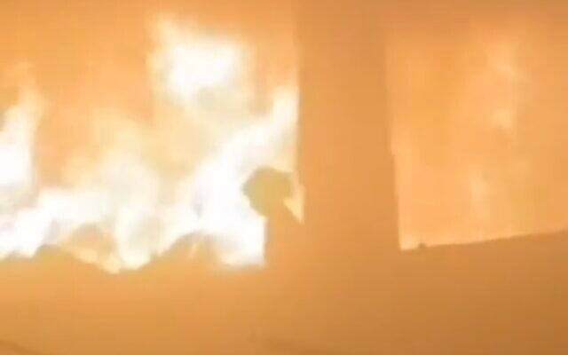Screenshot of video circulating on social media that apparently shows a girl trying to escape after a strike on Fahmi Al-Jarjawi School in the Al-Daraj neighborhood of Gaza City on May 26, 2025. The IDF said it was targeting Hamas in the strike (Used in accordance with Clause 27a of the Copyright Law)