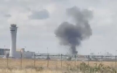 Smoke in the area of Ben Gurion Airport after a ballistic missile was fired at Israel from Yemen on May 4, 2025 (Screen grab from social media used in accordance with Clause 27a of the Copyright Law)