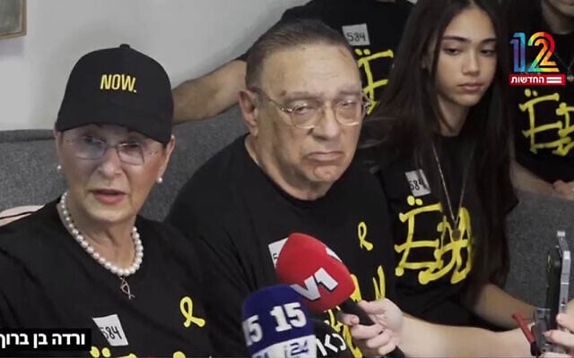 Edan Alexander's grandmother, Varda Ben Baruch (left), speaks to reporters on May 12, 2025 (Channel 12 screenshot)
