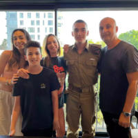 File: Edan Alexander (second right) with his family (from left to right): sister Mika, brother Roy, mother Yael and father Adi. (Courtesy)