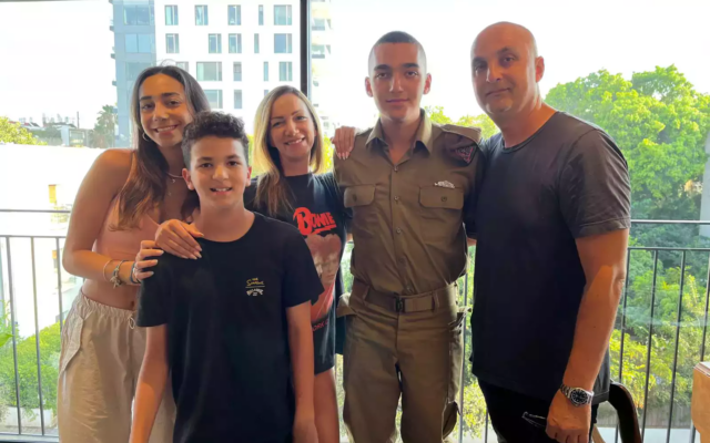 File: Edan Alexander (second right) with his family (from left to right): sister Mika, brother Roy, mother Yael and father Adi. (Courtesy)