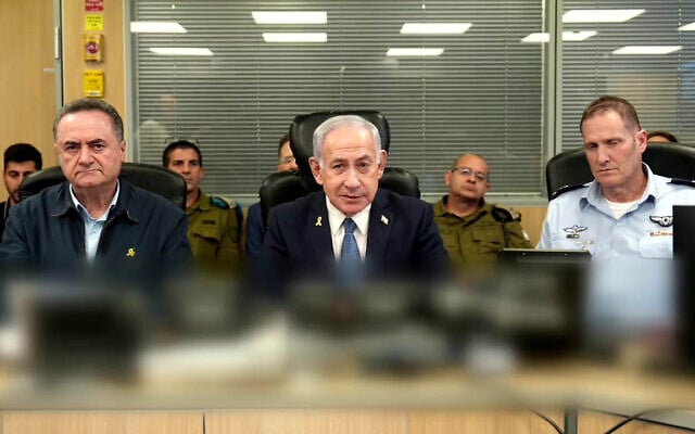 Prime Minister Benjamin Netanyahu (C), Defense Minister Israel Katz (L) and Brig. Gen. Omer Tischler, the IAF’s chief of staff, observing strikes on Houthi targets in the Yemeni capital of Sanaa, at the Kirya military headquarters in Tel Aviv on May 6, 2025. (Screenshot)
