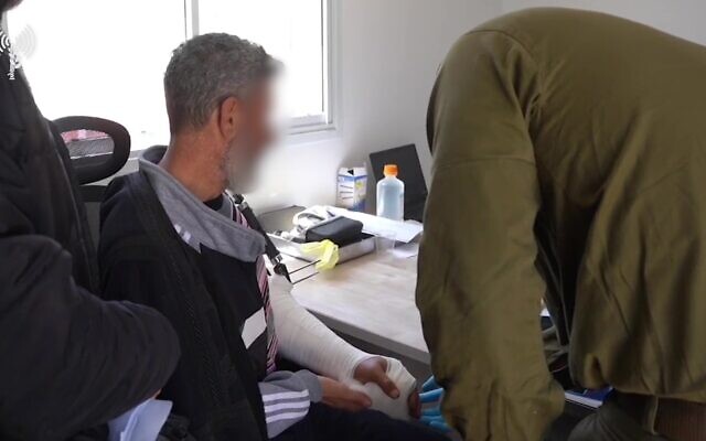 IDF troops treat a wounded Syrian Druze man at a new medical facility in southern Syria, in footage published by the military on May 8, 2025. (Israel Defense Forces) IDF troops treat a wounded Syrian Druze man at a new medical facility in southern Syria, in footage published by the military on May 8, 2025. (Israel Defense Forces)