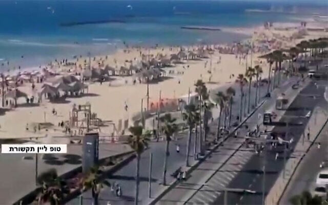 Israelis on Tel Aviv beach run for safety as missile sirens sound, May 9, 2025. A missile fired by the Houthis in Yemen was intercepted beyond Israel's borders. (X screenshot; used in accordance with clause 27a of the copyright law) Israelis on Tel Aviv beach run for safety as missile sirens sound, May 9, 2025. A missile fired by the Houthis in Yemen was intercepted beyond Israel's borders. (X screenshot; used in accordance with clause 27a of the copyright law)