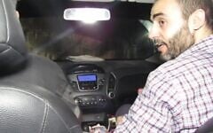 A screenshot of an undated video released by the Israel Defense Forces on December 17, 2023, shows Hamas commander Muhammad Sinwar, right, riding in a car traveling through a tunnel under the Gaza Strip. (Screenshot: Israel Defense Forces)